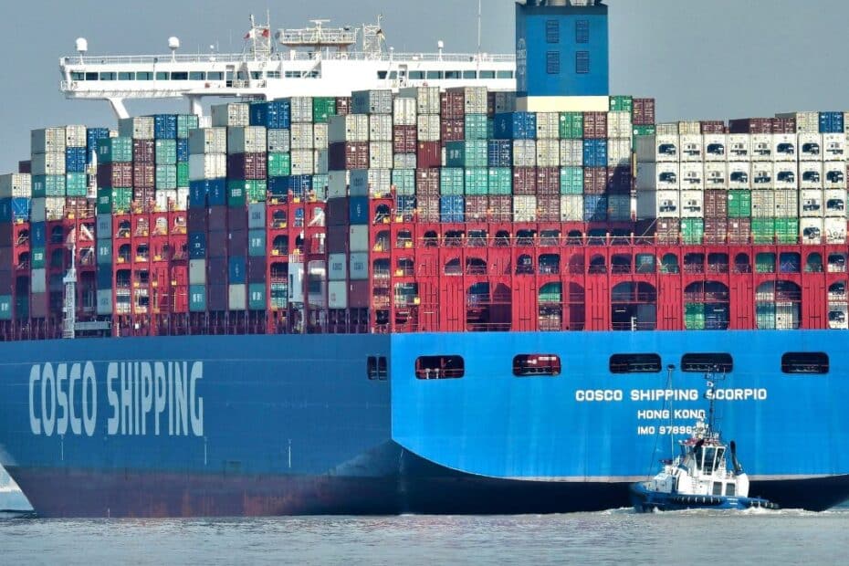 Cosco container ship with tugboat