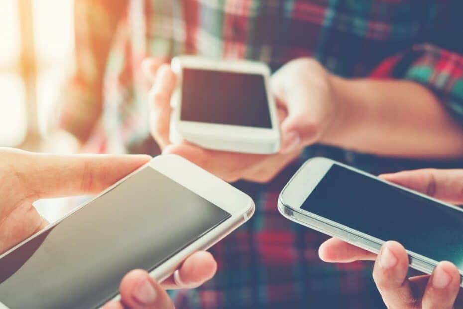 Mobile phones in hands